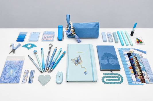 arctic icy blue colored stationary with notebook, pens, book light, 