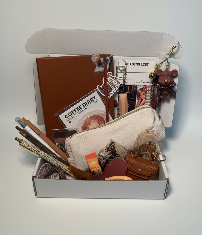 Brown stationary items including journal, pencil pouch, pens, highlighters, sticky notes, charms and more