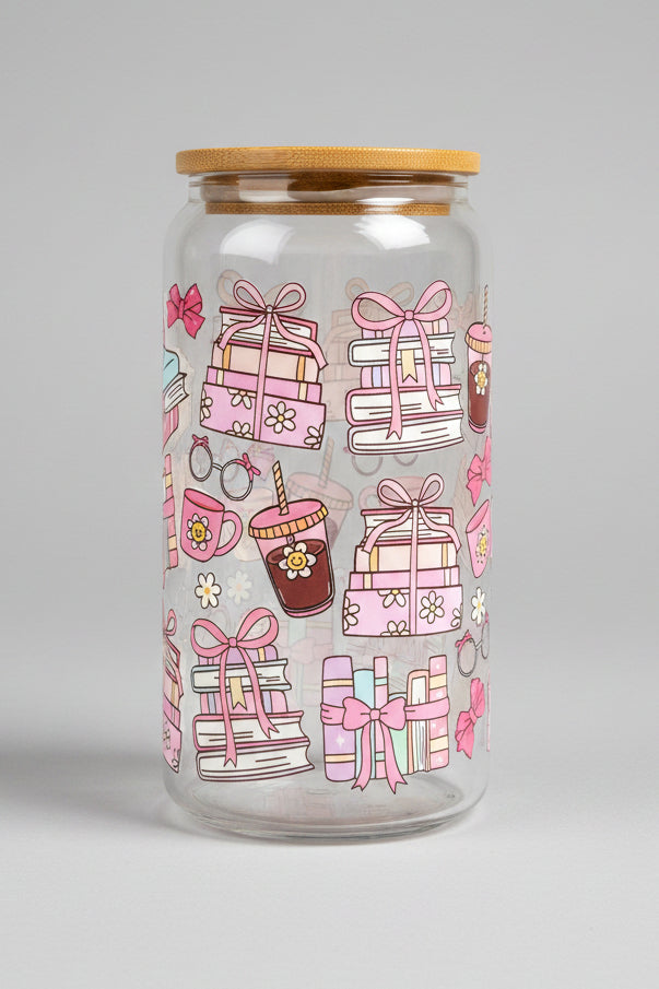Glass jar with pink gift box pattern on a wooden surface outdoors