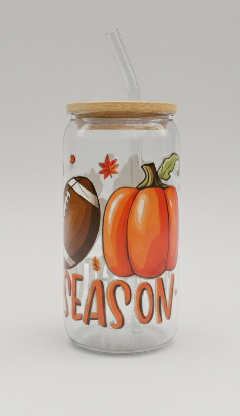 fall football cup with pumpkins, coffee cup and leaves