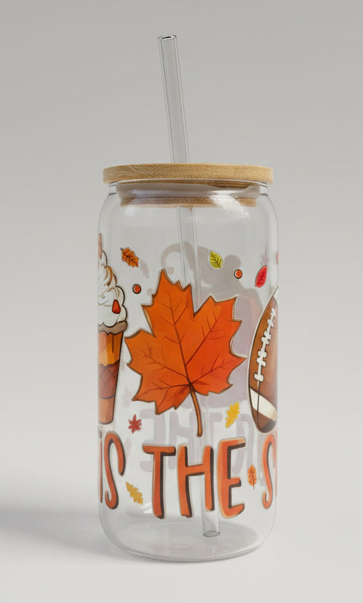 fall cup with football, coffee cup, pumpkin and leaves