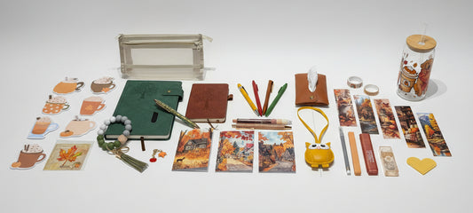 fall inspired stationary with green notebook brown notebook, pens, fall designed glass cup