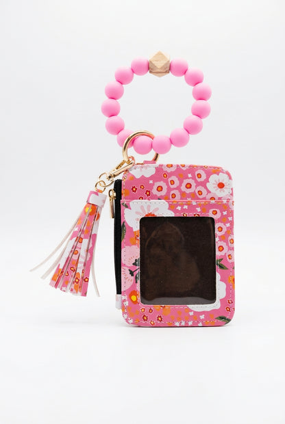 Pink floral silicone wristlet card holder