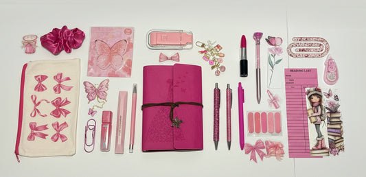 pink aesthetic stationary bundle including pink embossed journal, pens, book light and more